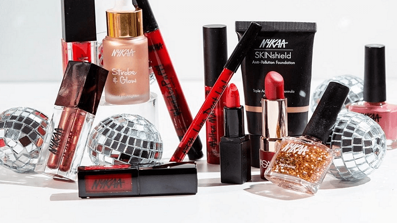 nykaa makes glamorous debut on share market, lists at 2,018 rupees per share