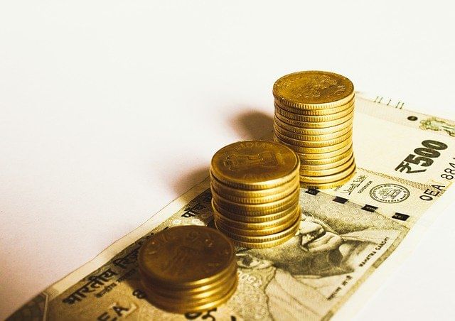 Rupee plummets 105 paise to close at 74.47 against US dollar