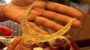 Gold down Rs 230/10 gm, silver flat in early trade