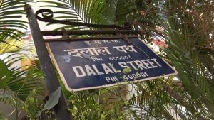 Sensex, Nifty inch lower in early trade amid volatility; auto stocks rally